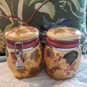 Set of two handpainted ceramic jars with lids